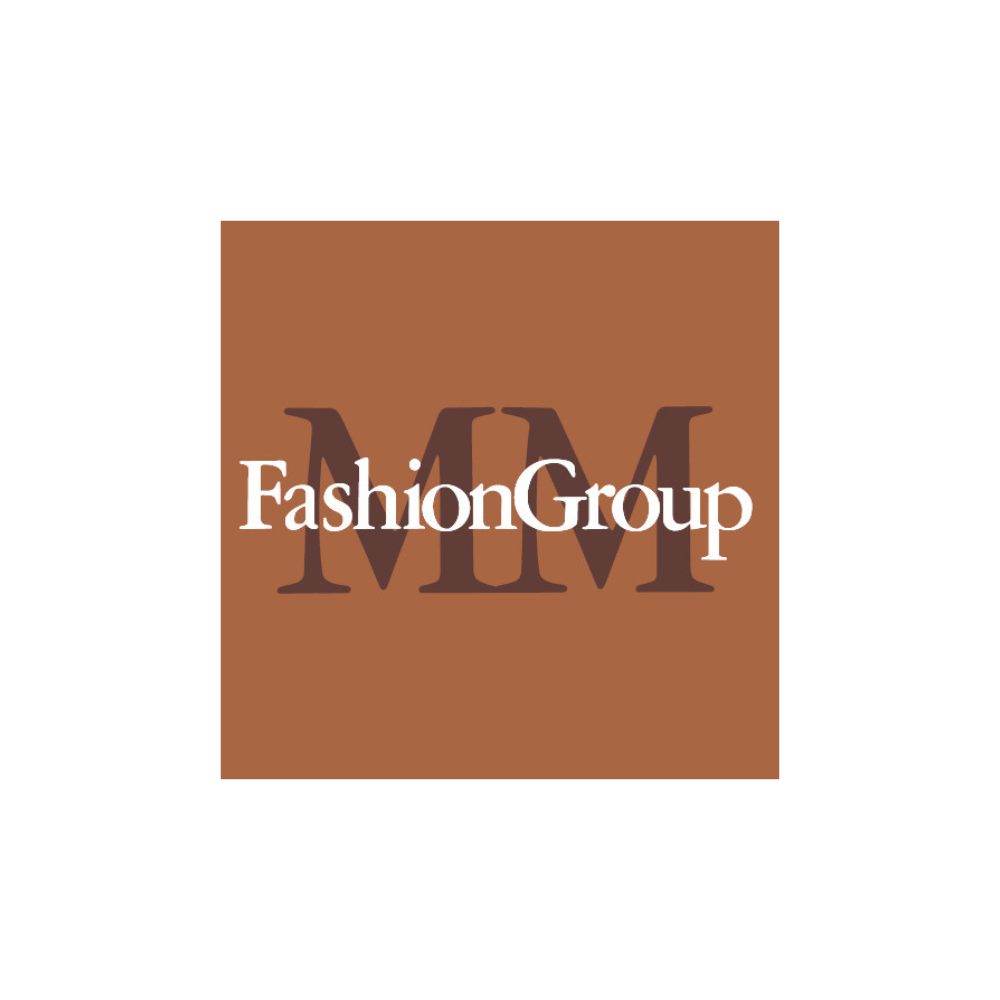 FashionGroup logo on a brown square, with large dark M letters behind and the word 'FashionGroup' in white across the center.