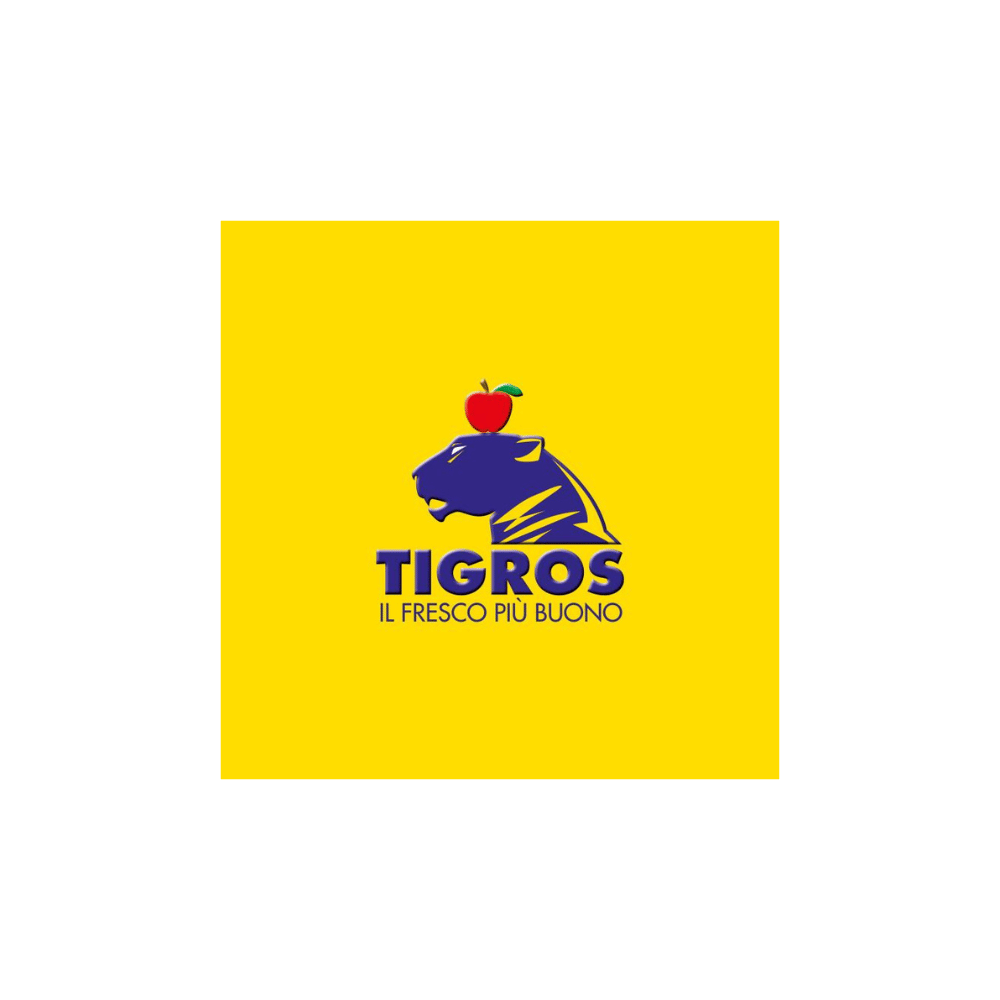 Tigros logo on a bright yellow background, showing a blue tiger head with a red apple on top and the slogan 'Il fresco più buono'.